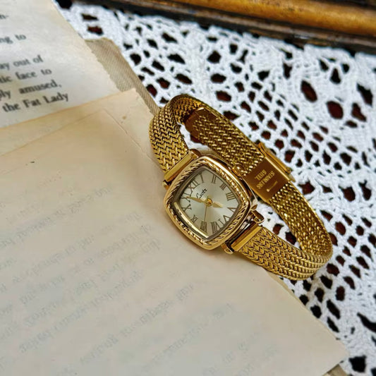 Strapped Gold Watch